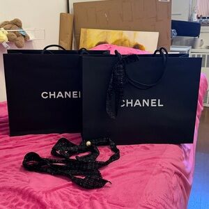 Chanel Black Paper  Bag Set with the ribbon and Chanel gold charm :)